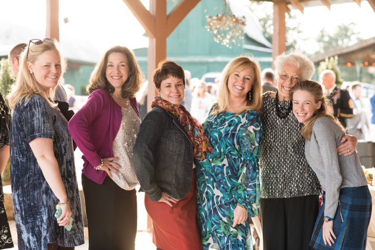 Group of women enjoying an outdoor gathering.
