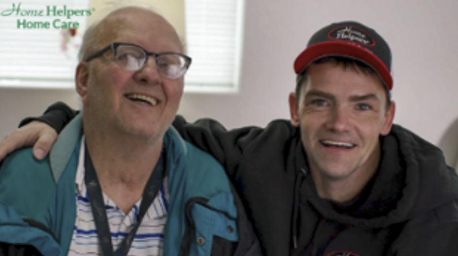 Senior resident enjoying time with staff member