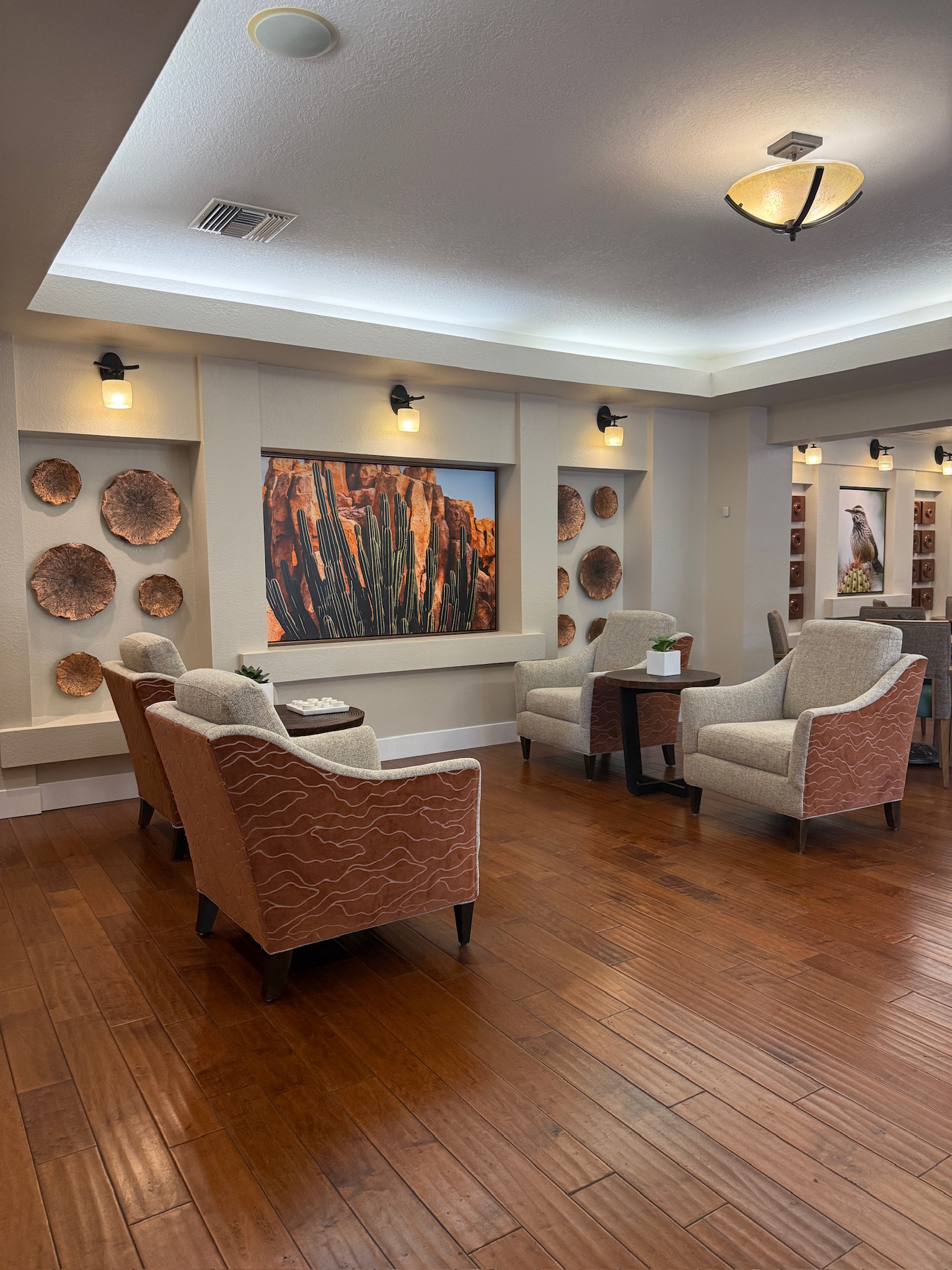 Comfortable common area with stylish seating and art
