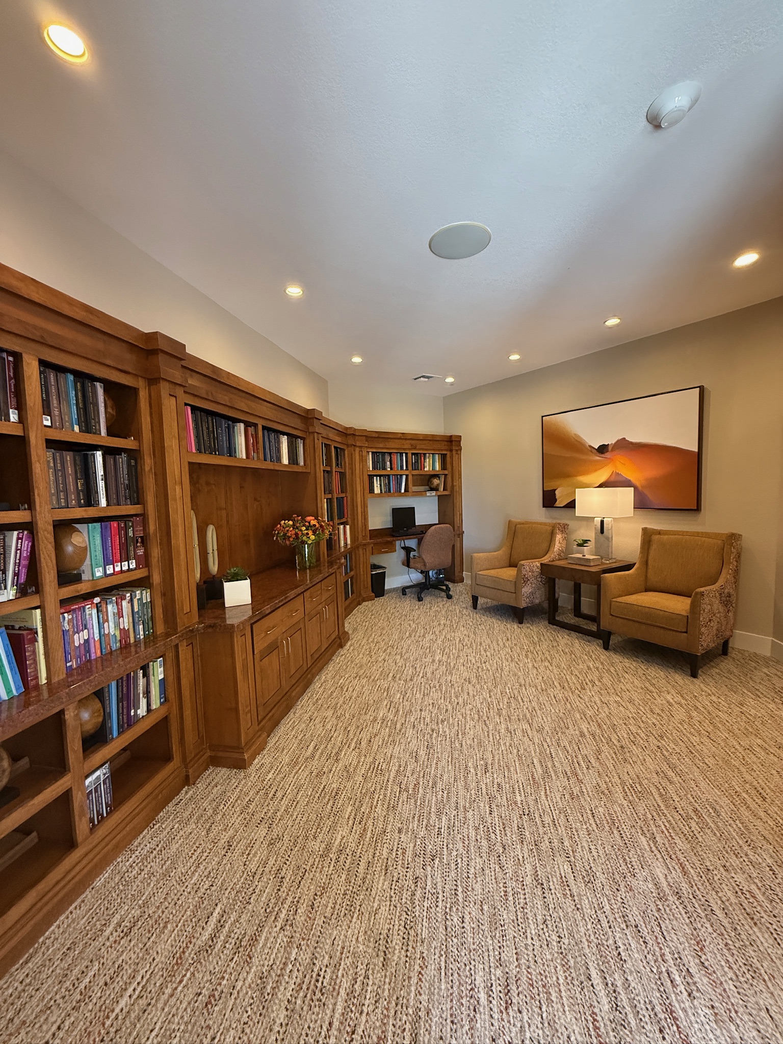 Interior of a cozy common area with bookshelves