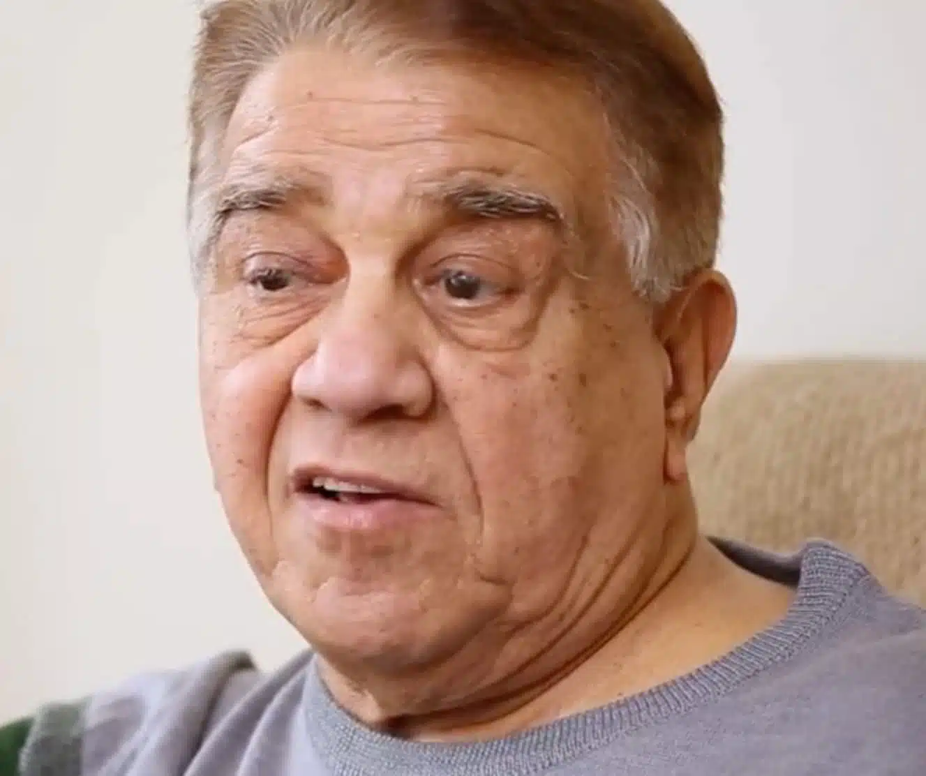 Close-up of an elderly man smiling