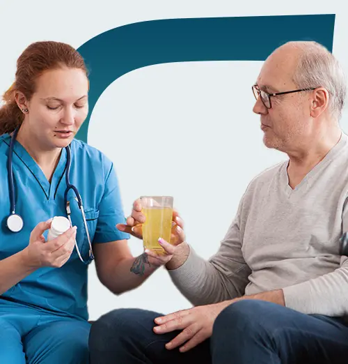 Nurse assisting senior with medication
