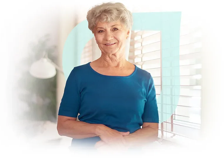 Smiling older woman in a bright interior