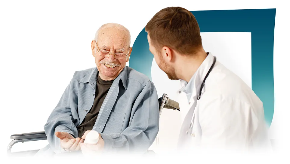 Senior man smiling with healthcare professional