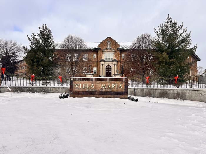 Exterior view of Villa Maria Retirement Community covered in snow