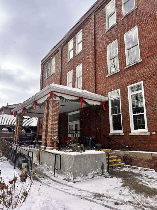 Exterior view of Villa Maria Retirement Community decorated for the holidays