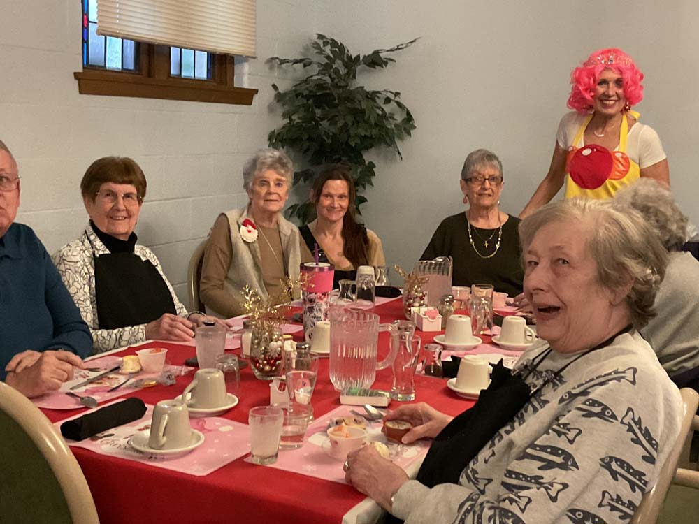 Residents enjoying a festive gathering with entertainment
