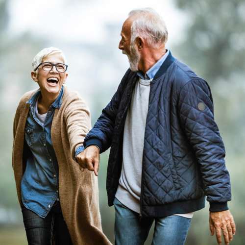 Couple walking outdoors, enjoying quality time
