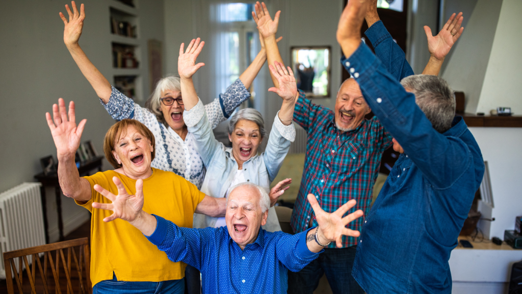 Residents joyfully celebrating in a common area