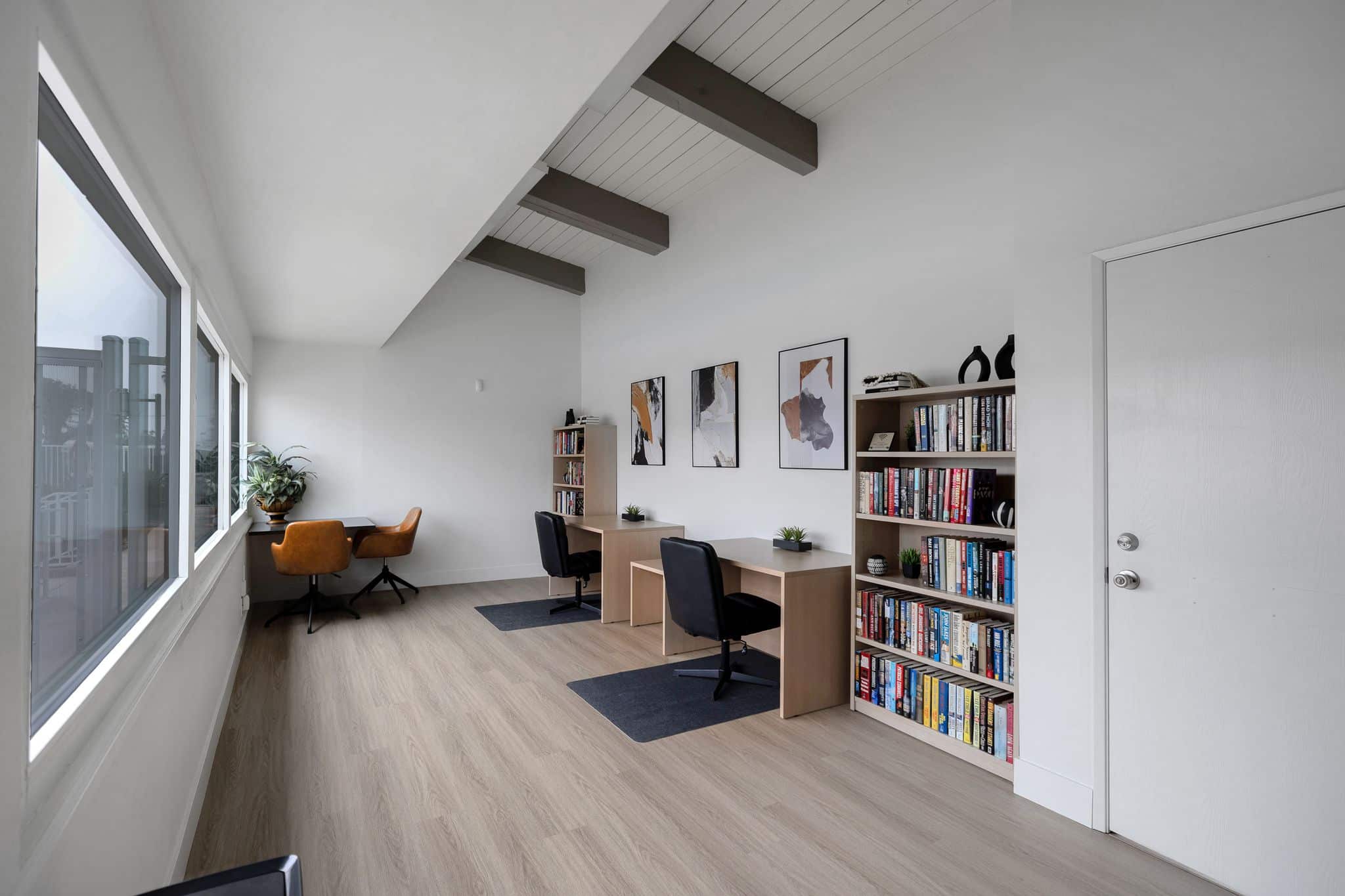 Bright interior space with desks and bookshelves
