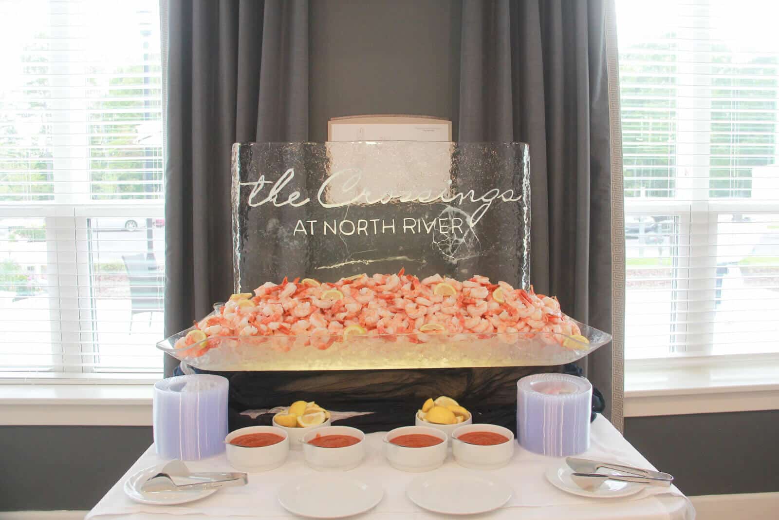 A seafood display with shrimp at an event