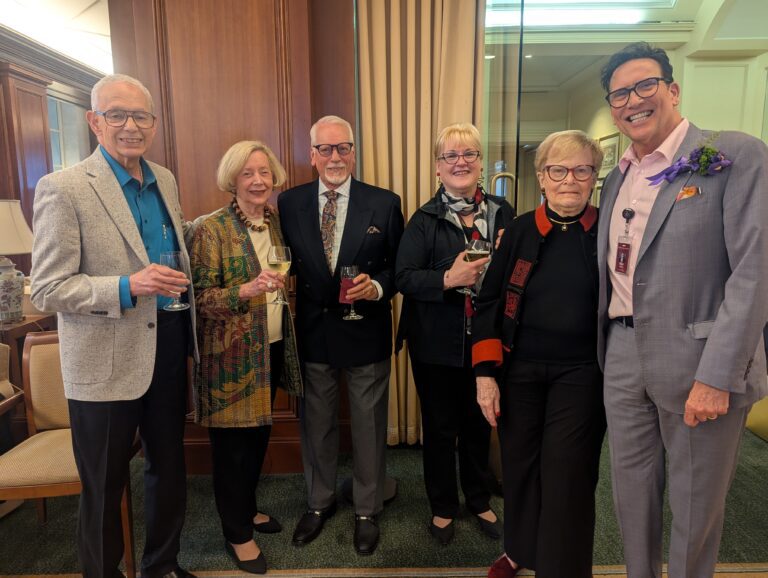 Residents and staff enjoying a social gathering