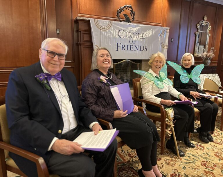 Residents participating in a themed event in a common area