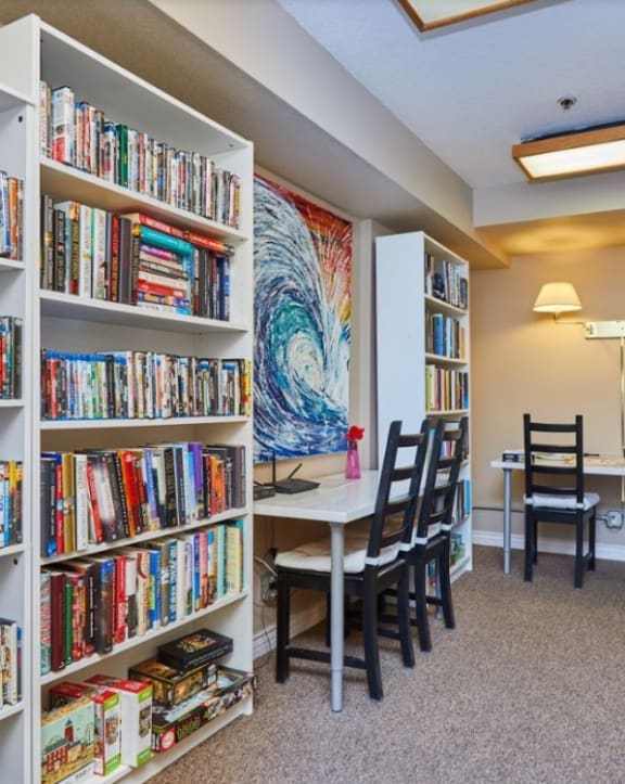 Interior common area with bookshelves and seating