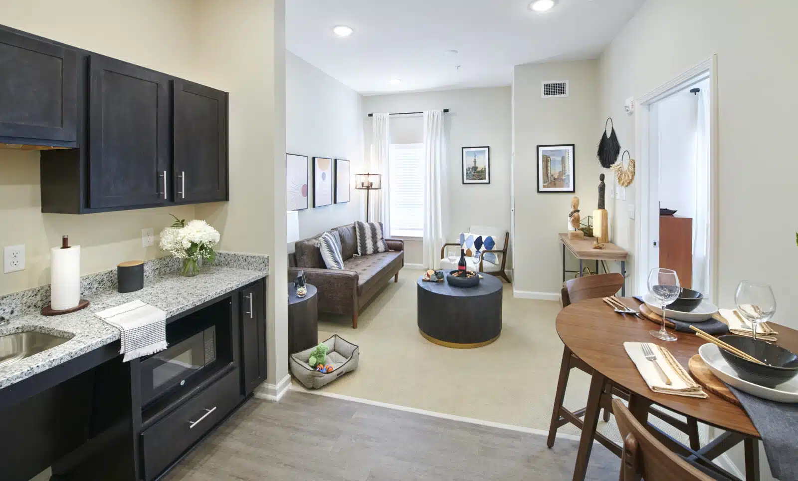 Interior view of a cozy resident suite with a kitchenette