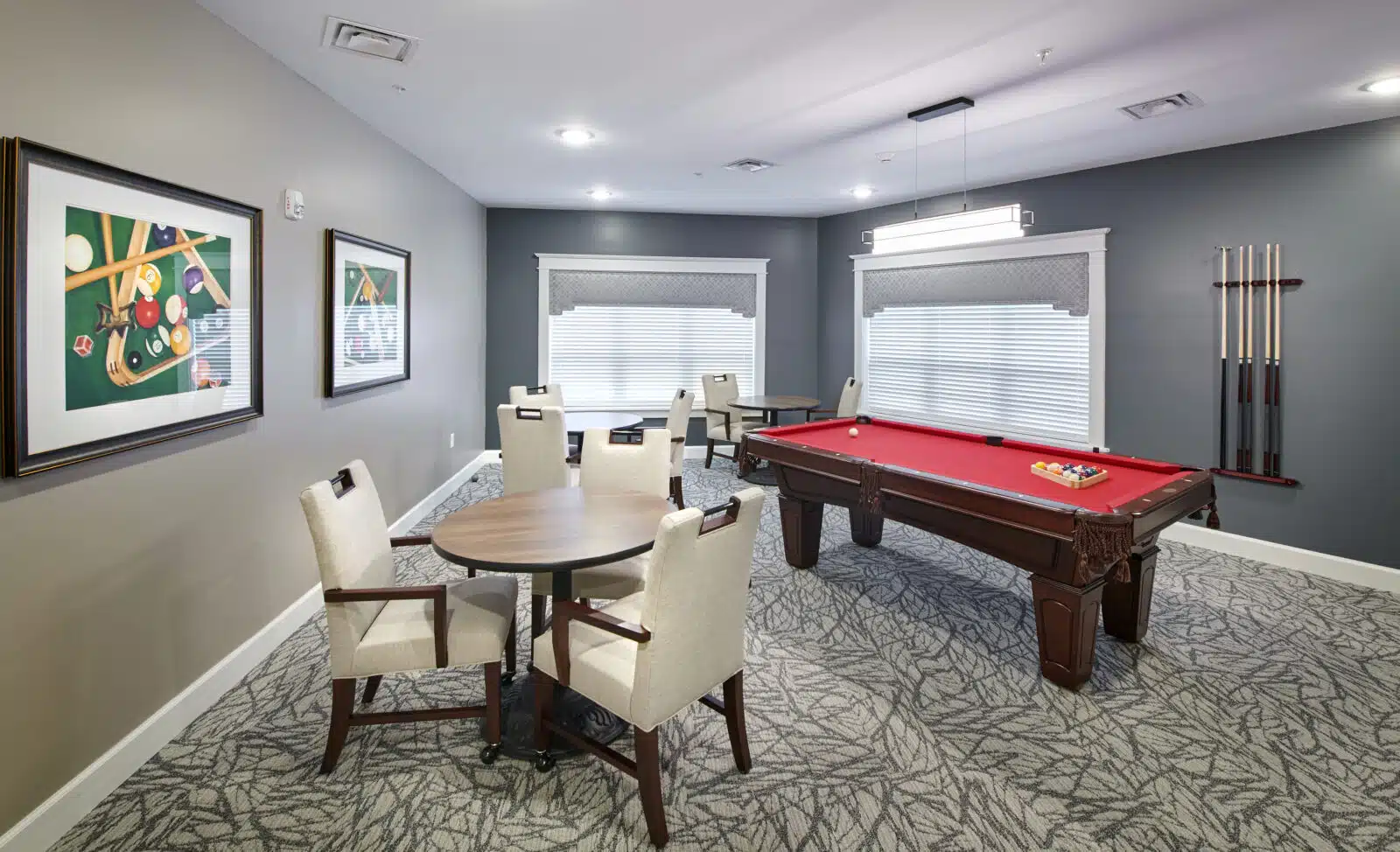 Interior game room with pool table and seating area