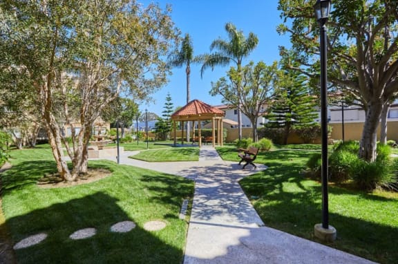 Lush garden area with gazebo and walking path