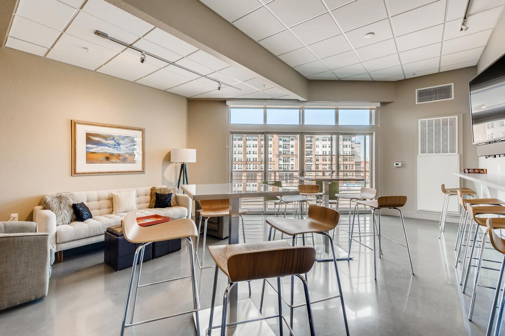 Common area with seating and large windows