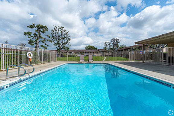 A clear and inviting swimming pool area
