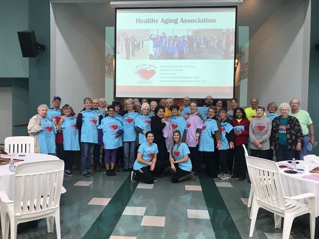Group of residents and staff at a community event