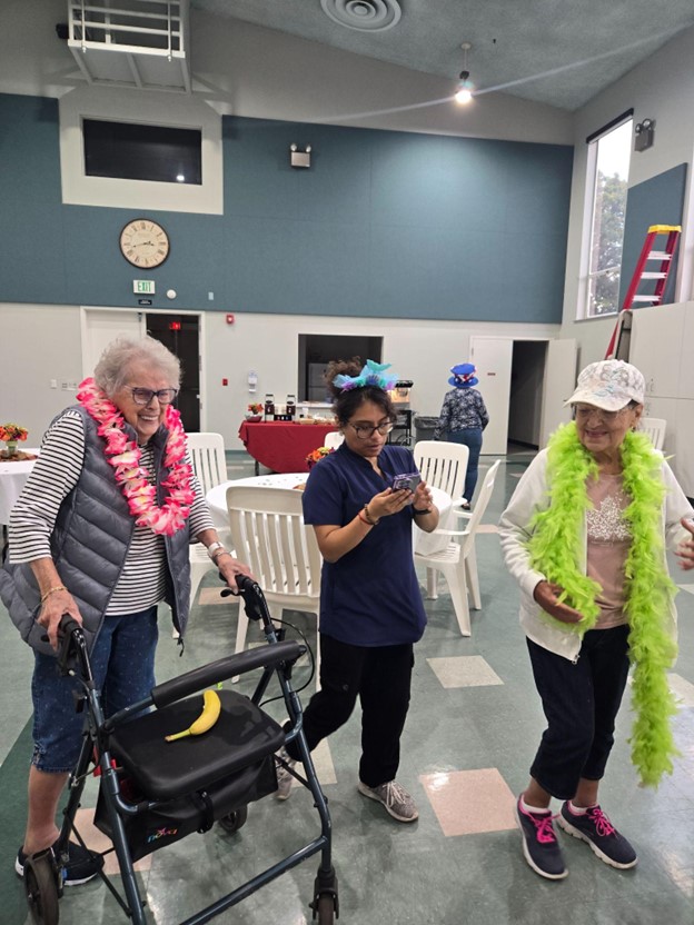 Residents participating in a festive indoor activity