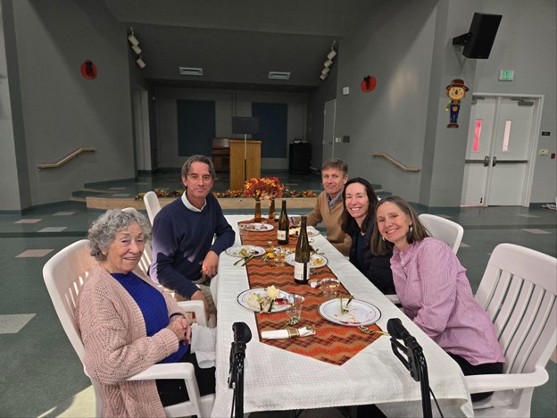 Residents enjoying a meal together in a dining area.