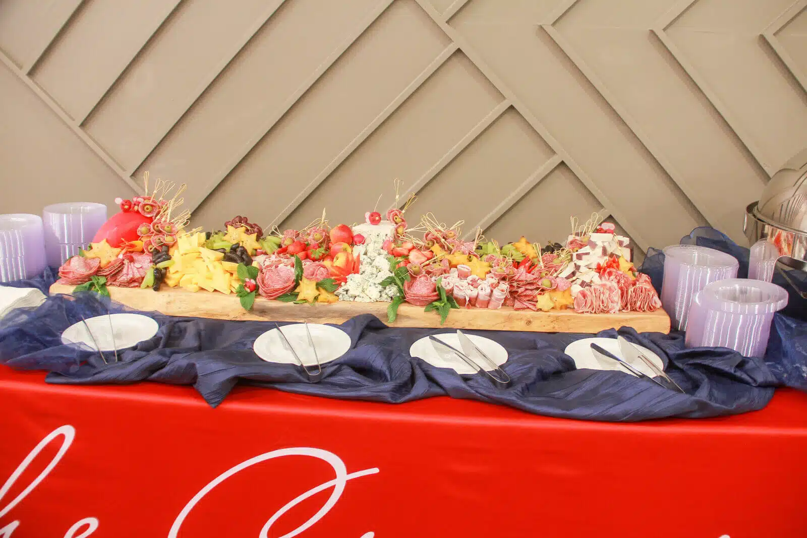An elegantly arranged charcuterie board on a table