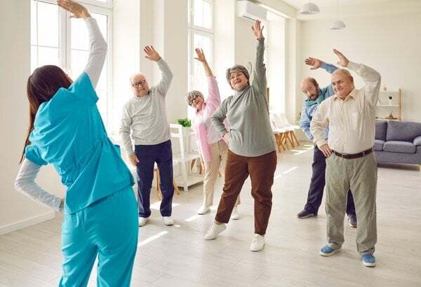 Residents participating in a group exercise class