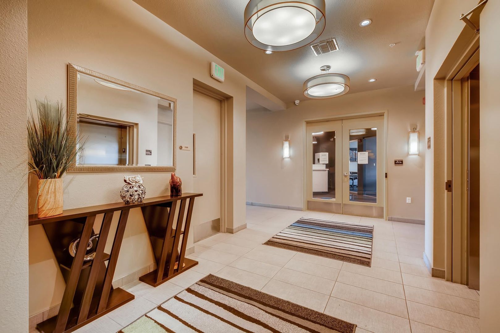Bright and welcoming interior hallway with decor
