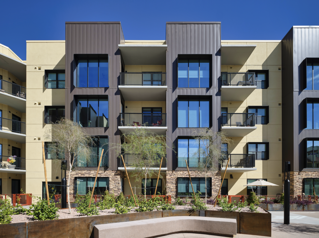Exterior view of Friendship Village Tempe building with landscaping