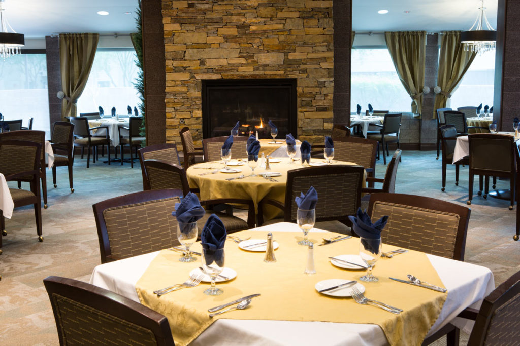 Dining area with tables set for a meal