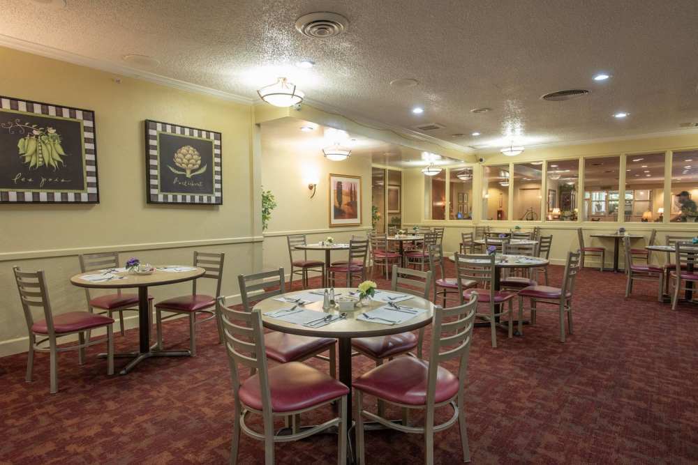 Dining area with tables set for meals