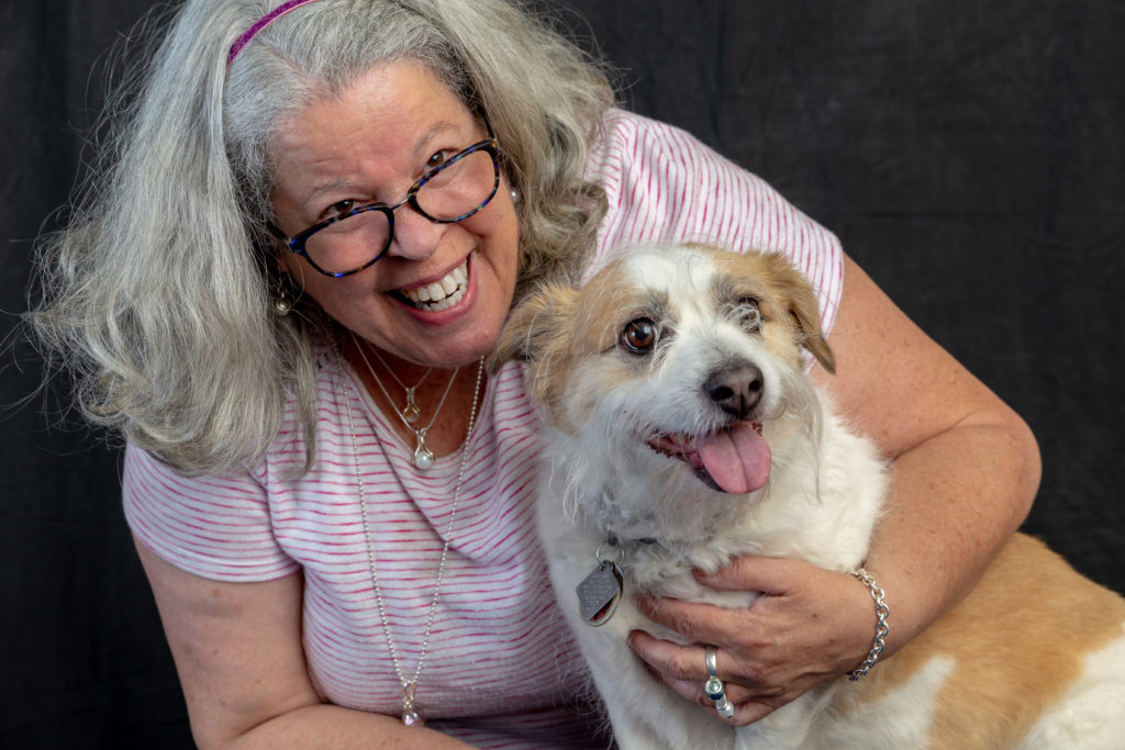 Resident enjoying time with a dog
