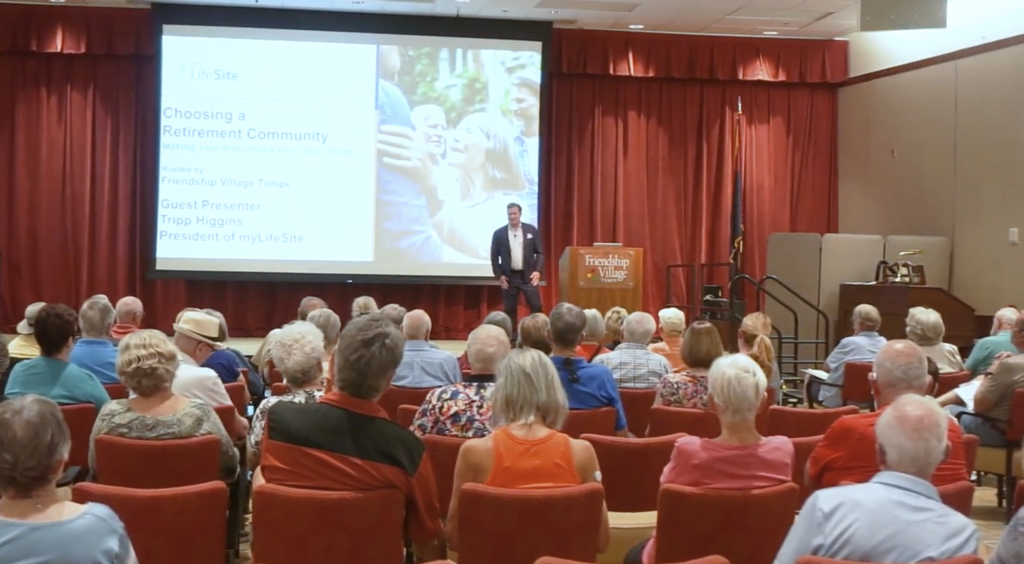 Residents attending a presentation in a common area