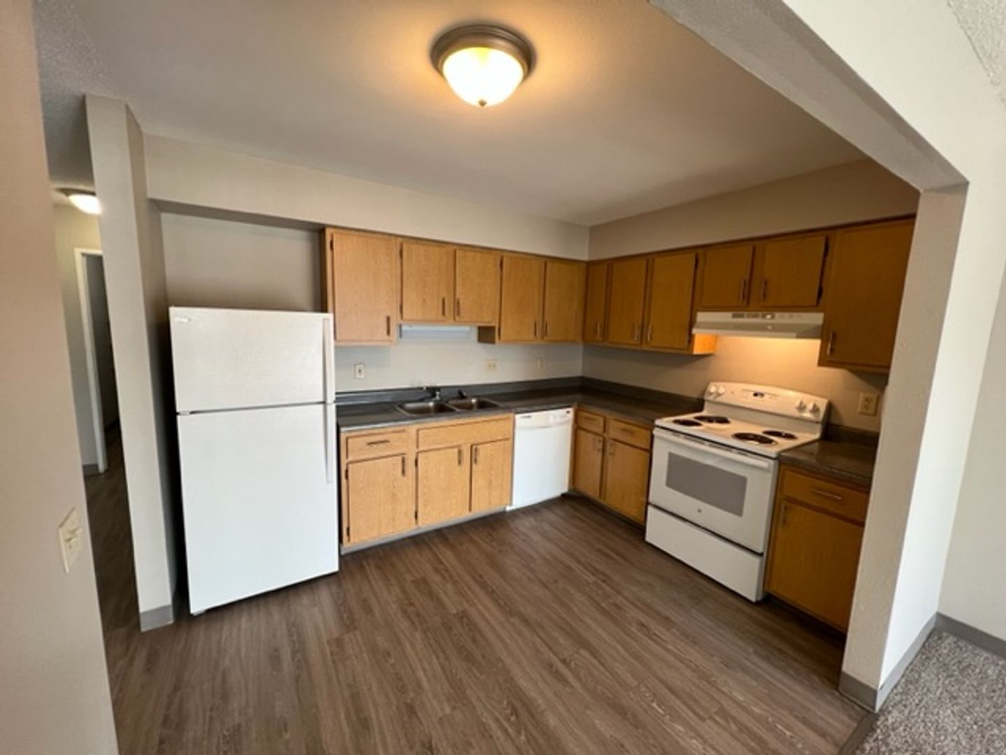 A well-equipped kitchenette in a senior living unit