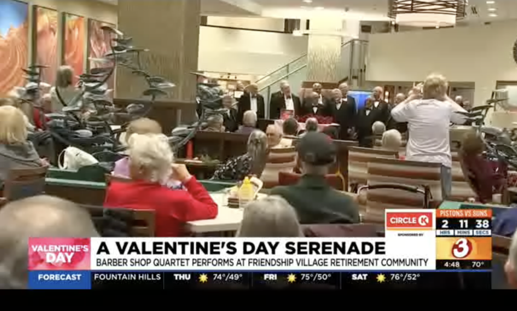 Residents enjoying a Valentine's Day serenade performance
