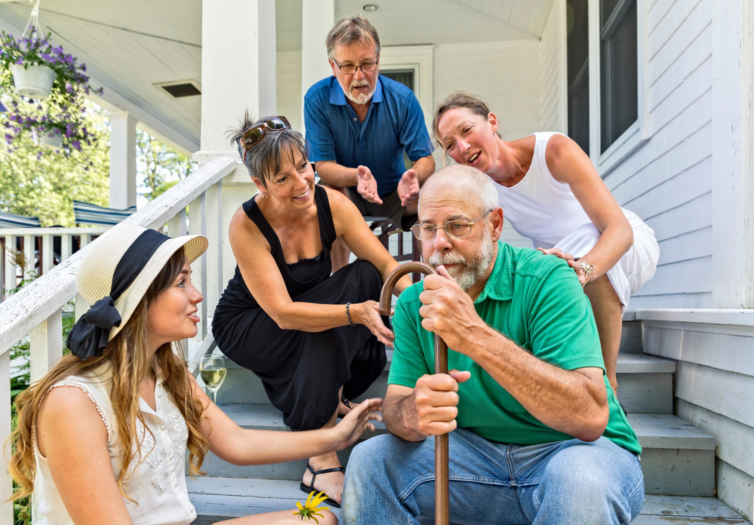 Residents enjoying time together on a porch