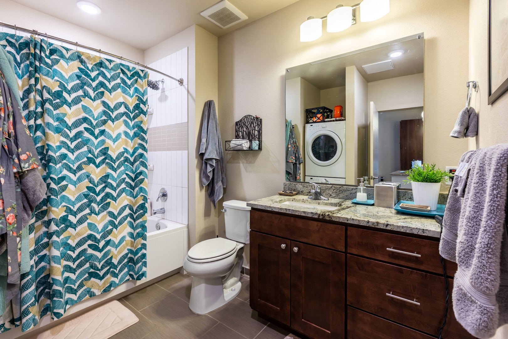 Brightly decorated bathroom with modern fixtures