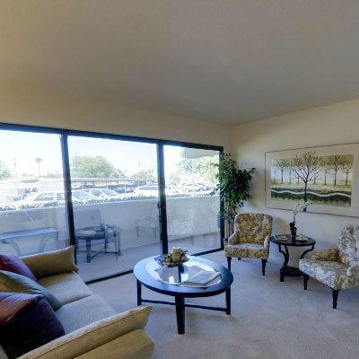 Cozy living area with a view through large windows