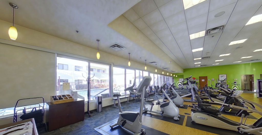 Interior view of a fitness area with exercise equipment