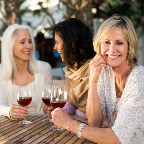 Residents enjoying drinks at an outdoor gathering
