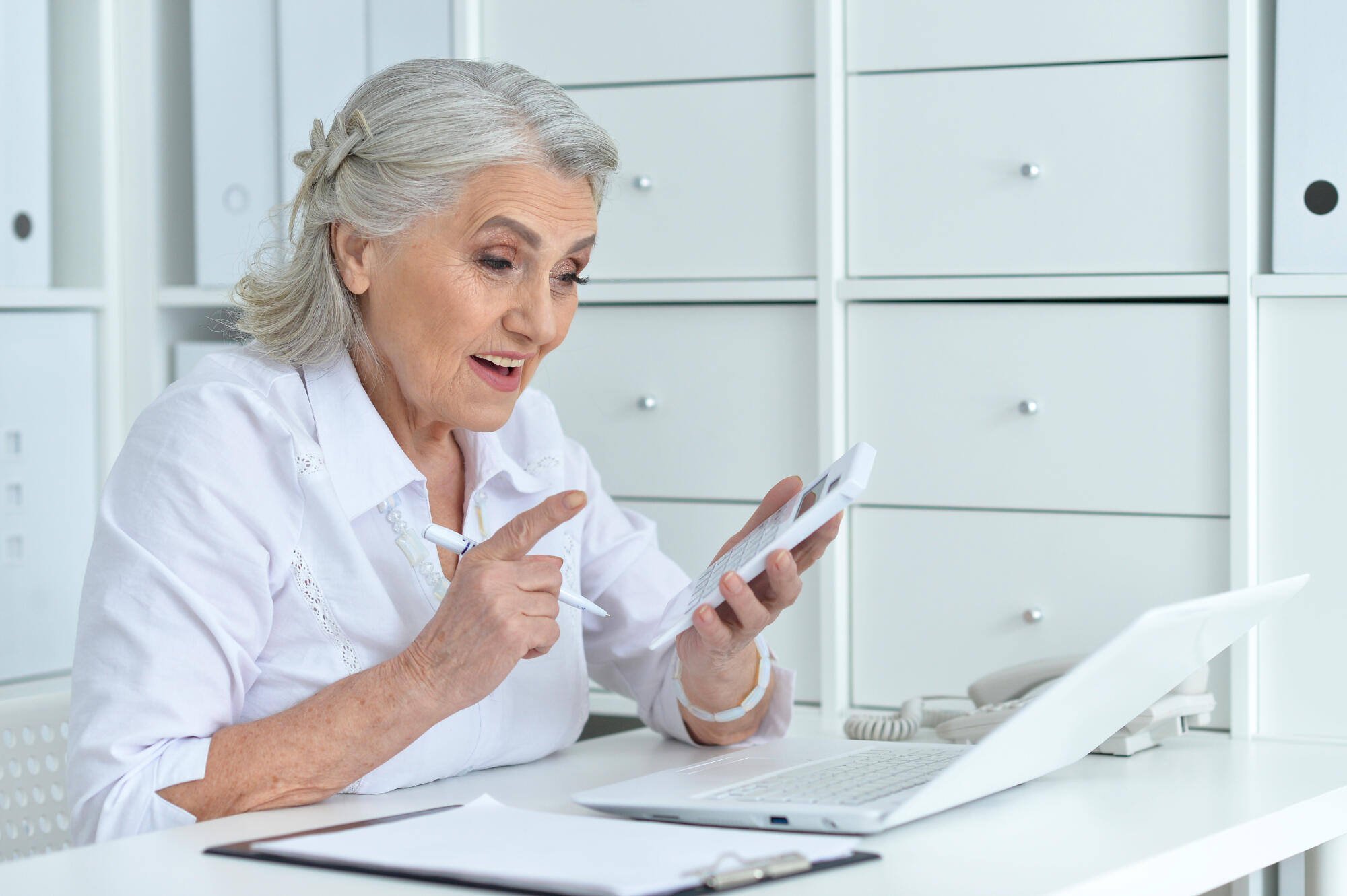 Resident engaged in a conversation using a smartphone