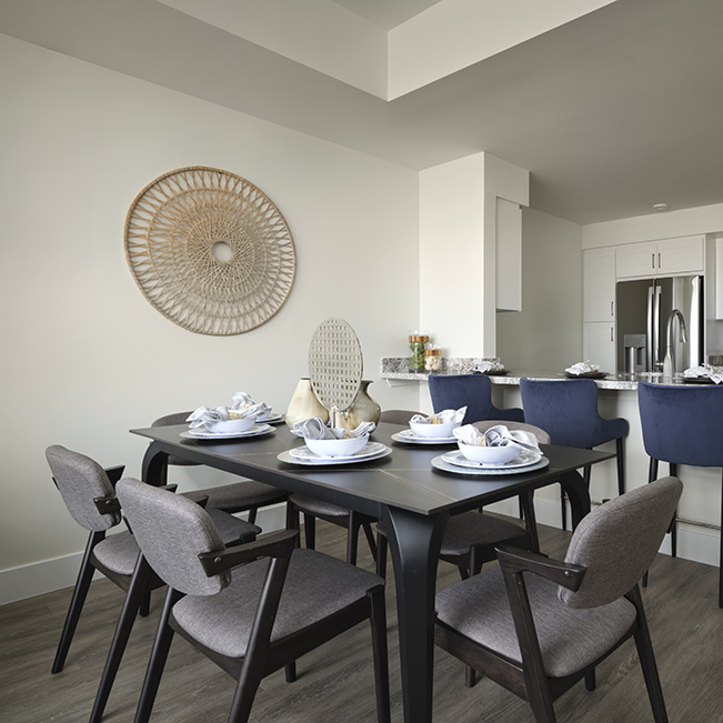 Bright dining area with set table and modern decor