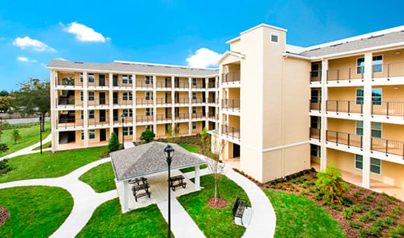 View of the facility's outdoor garden and apartment structure