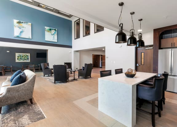 Bright common area with seating and dining space