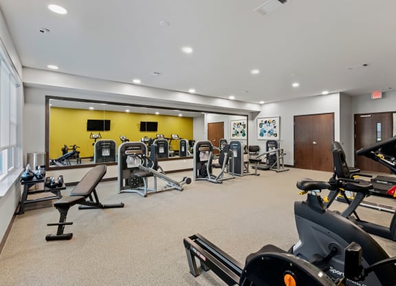 Interior fitness room with exercise equipment