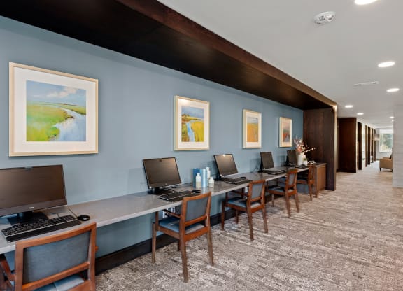 A common area with computer stations and artwork