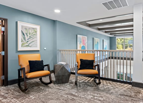 Bright common area with seating and artwork
