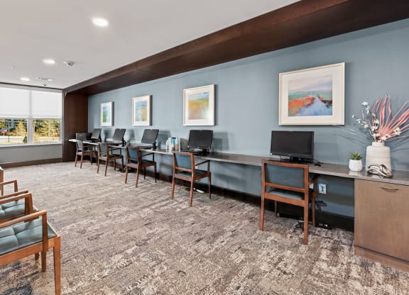Interior common area with computers and artwork