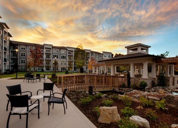 Outdoor space with seating and landscaped gardens